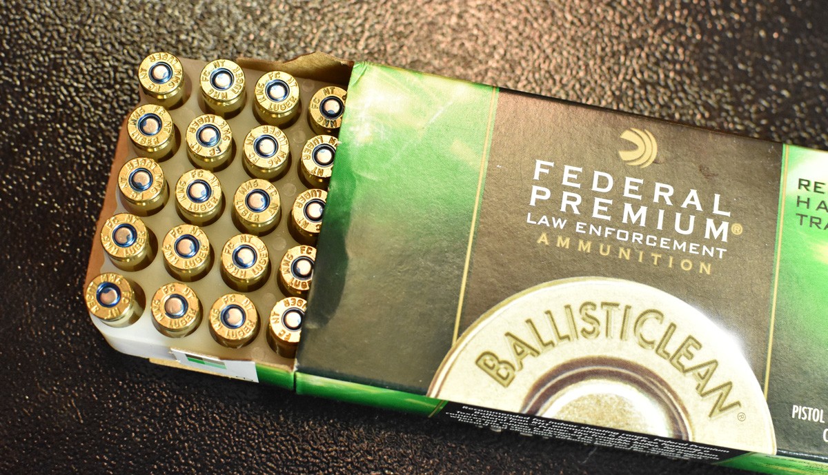 Brass cased 9x19 ammo on a table