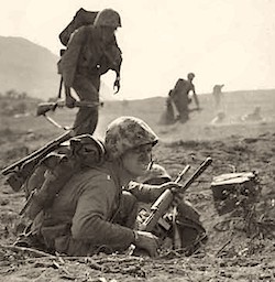 Marine carrying an M1 rifle chambered for 30 carbine ammo