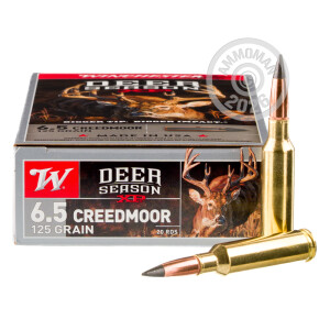 Image of Winchester 6.5mm Creedmoor rifle ammunition.