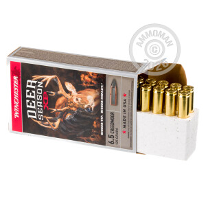 Image of Winchester 6.5mm Creedmoor rifle ammunition.