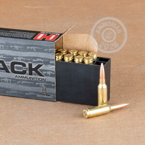 A photograph detailing the 6mm ARC ammo with Hollow-Point Boat Tail (HP-BT) bullets made by Hornady.