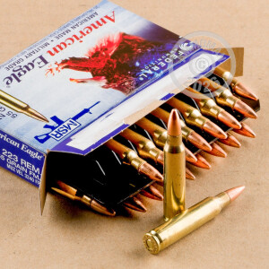 A photograph of 500 rounds of 55 grain 223 Remington ammo with a FMJ-BT bullet for sale.