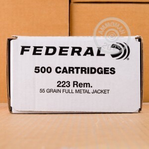 A photograph of 500 rounds of 55 grain 223 Remington ammo with a FMJ bullet for sale.