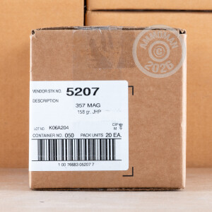 A photograph of 50 rounds of 158 grain 357 Magnum ammo with a JHP bullet for sale.