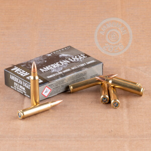 A photograph of 500 rounds of 55 grain 223 Remington ammo with a Full Metal Jacket Boat Tail (FMJ-BT) bullet for sale.