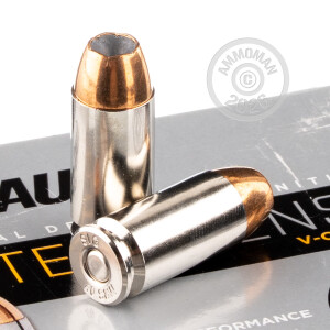 A photograph detailing the .40 Smith & Wesson ammo with JHP bullets made by SIG.