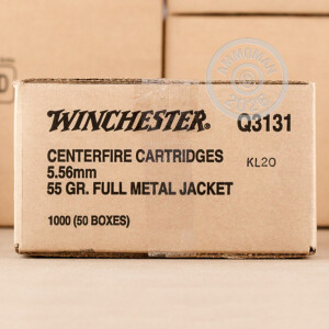 A photograph of 20 rounds of 55 grain 5.56x45mm ammo with a FMJ bullet for sale.