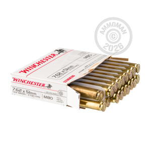 A photograph detailing the 308 / 7.62x51 ammo with FMJ bullets made by Winchester.
