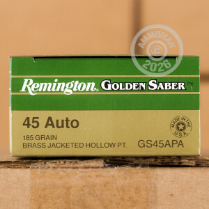 A photograph detailing the .45 Automatic ammo with JHP bullets made by Remington.