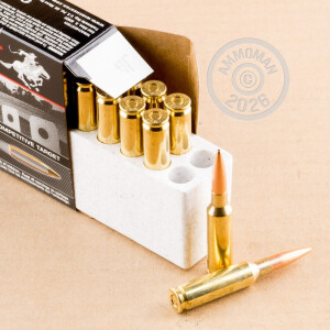 A photograph detailing the 6.5MM CREEDMOOR ammo with Hollow-Point Boat Tail (HP-BT) bullets made by Winchester.