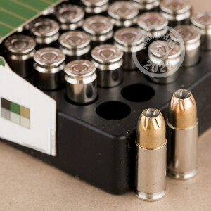 A photograph of 500 rounds of 147 grain 9mm Luger ammo with a JHP bullet for sale.