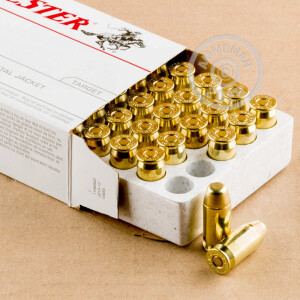 A photograph detailing the .45 Automatic ammo with FMJ bullets made by Winchester.