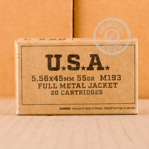 A photograph detailing the 5.56x45mm ammo with FMJ bullets made by Winchester.