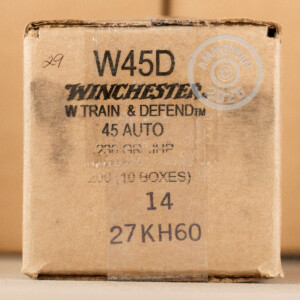 A photograph detailing the .45 Automatic ammo with JHP bullets made by Winchester.