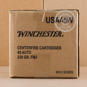 A photograph detailing the .45 Automatic ammo with FMJ bullets made by Winchester.