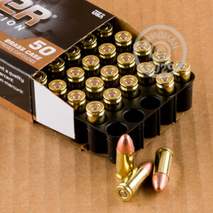A photograph detailing the 9mm Luger ammo with FMJ bullets made by Blazer Brass.