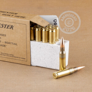A photograph detailing the 308 / 7.62x51 ammo with FMJ-BT bullets made by Winchester.