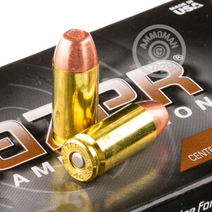 A photograph detailing the .40 Smith & Wesson ammo with FMJ bullets made by Blazer Brass.