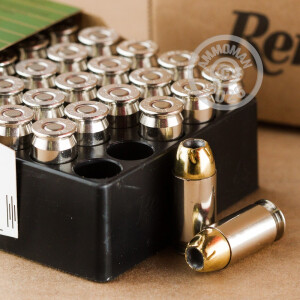 A photograph detailing the .45 Automatic ammo with JHP bullets made by Remington.