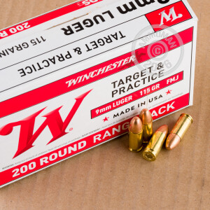A photograph of 1000 rounds of 115 grain 9mm Luger ammo with a FMJ bullet for sale.