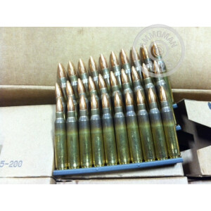 A photograph detailing the 5.56x45mm ammo with FMJ-BT bullets made by Federal.