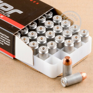 A photograph detailing the .40 Smith & Wesson ammo with FMJ bullets made by Blazer.