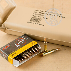 A photograph of 200 rounds of 55 grain 5.56x45mm ammo with a FMJ bullet for sale.