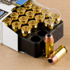 A photograph detailing the .45 Automatic ammo with JHP bullets made by Corbon.