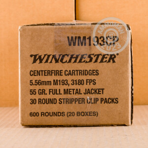 Image detailing the brass case and boxer primers on 30 rounds of Winchester ammunition.