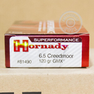 A photograph of 20 rounds of 120 grain 6.5MM CREEDMOOR ammo with a GMX bullet for sale.