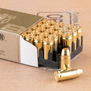 A photograph of 50 rounds of 140 grain 9mm Luger ammo with a FMJ bullet for sale.