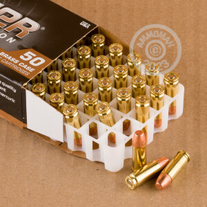 A photograph of 50 rounds of 115 grain 30 Super Carry ammo with a FMJ bullet for sale.