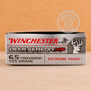 A photograph detailing the 6.5MM CREEDMOOR ammo with Polymer Tipped bullets made by Winchester.
