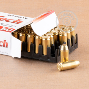 A photograph detailing the .40 Smith & Wesson ammo with FMJ bullets made by MaxxTech.