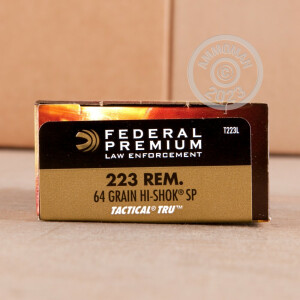 A photograph of 20 rounds of 64 grain 223 Remington ammo with a soft point bullet for sale.
