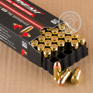 A photograph detailing the .45 Automatic ammo with TMJ bullets made by Streak.