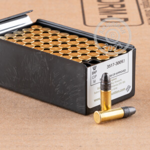 Photograph of .22 Long Rifle ammo with HP ideal for hunting varmint sized game, training at the range.