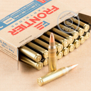 A photograph detailing the 5.56x45mm ammo with FMJ bullets made by Hornady.