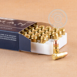A photograph of 50 rounds of 125 grain 357 SIG ammo with a TMJ bullet for sale.