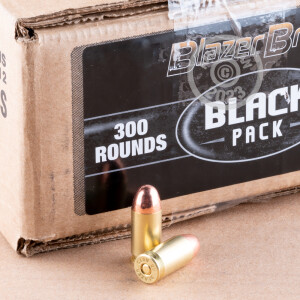 Image detailing the brass case and boxer primers on 300 rounds of Blazer Brass ammunition.