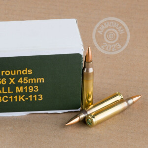 A photograph of 1000 rounds of 55 grain 5.56x45mm ammo with a FMJ-BT bullet for sale.