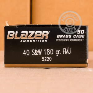 Image of .40 Smith & Wesson ammo by Blazer Brass that's ideal for training at the range.
