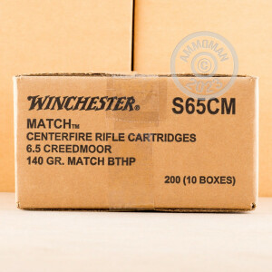 A photograph detailing the 6.5MM CREEDMOOR ammo with Hollow-Point Boat Tail (HP-BT) bullets made by Winchester.