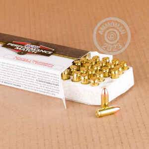 A photograph detailing the 38 Super ammo with FMJ bullets made by Corbon.