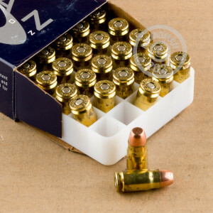 A photograph of 50 rounds of 125 grain 357 SIG ammo with a TMJ bullet for sale.