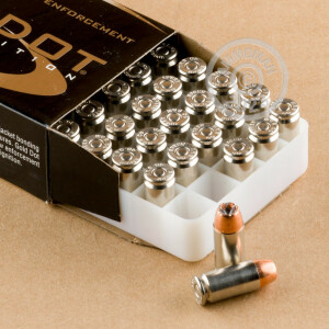 A photograph detailing the .40 Smith & Wesson ammo with JHP bullets made by Speer.