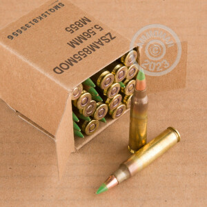 A photograph of 1800 rounds of 62 grain 5.56x45mm ammo with a FMJ bullet for sale.