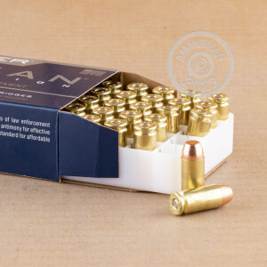 A photograph detailing the .40 Smith & Wesson ammo with TMJ bullets made by Speer.
