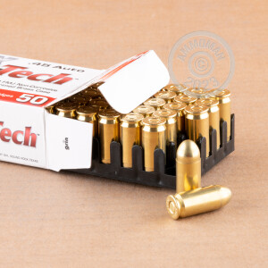 A photograph detailing the .45 Automatic ammo with FMJ bullets made by MaxxTech.