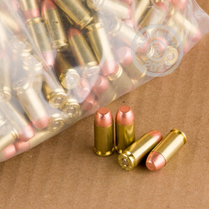 A photograph detailing the .40 Smith & Wesson ammo with FMJ bullets made by Independence.